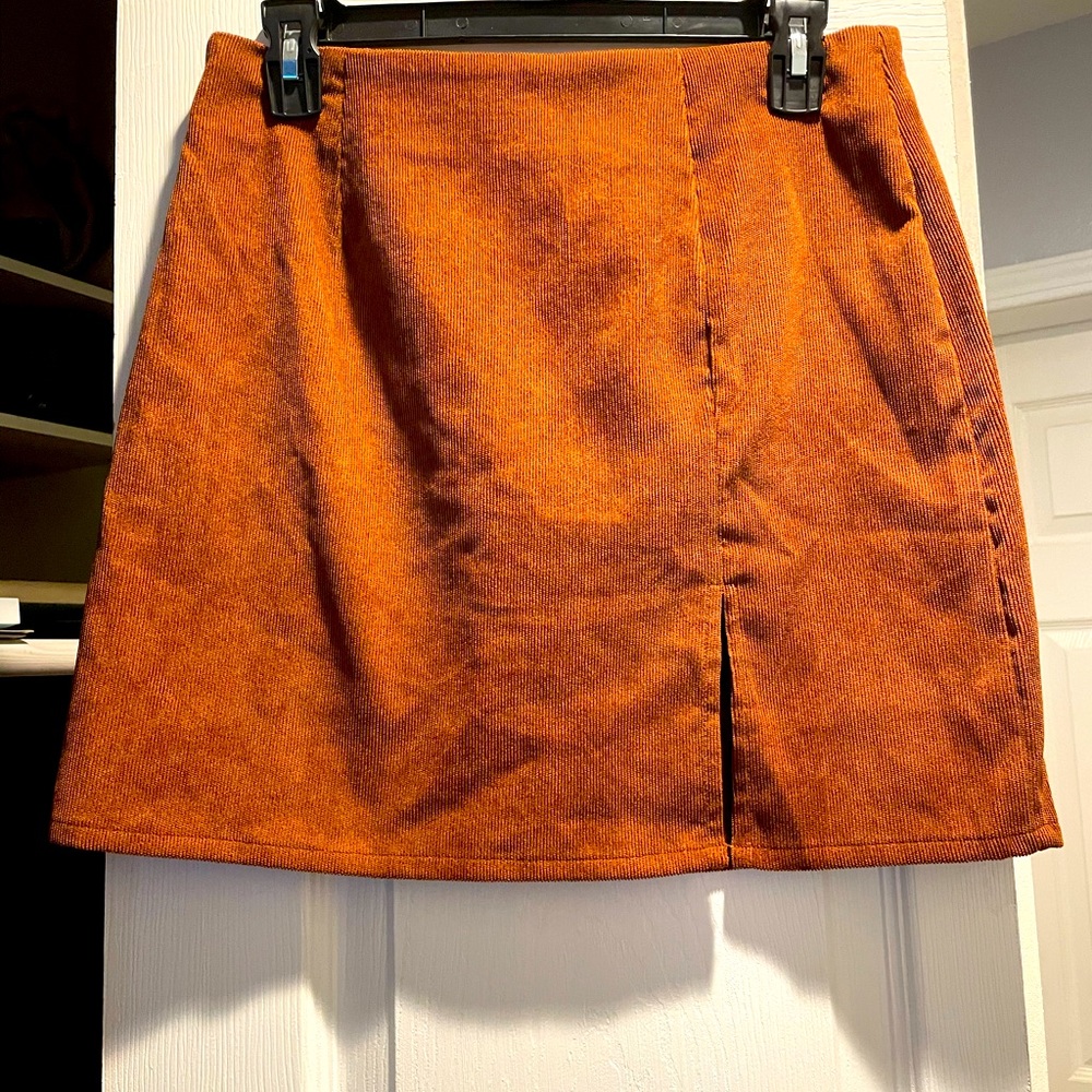 Dark orange/brown corduroy mini skirt with slit